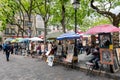 Place du Tertre in Paris with artists ready to paint tourists Royalty Free Stock Photo