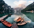 This place is heaven to travelers. Wooden boats on the crystal lake with majestic mountain behind. Reflection in the