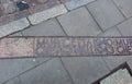 The place marked on the pavement where the wall of the Warsaw Ghetto was