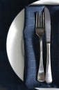 Place setting with blue napkin