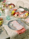 A place setting for a dinner guest at a colorfully decorated table