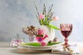 Place setting for Easter table with spring flowers Royalty Free Stock Photo