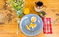 Place Setting With Orange Peels on Wooden Table With Knots