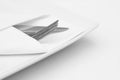 Place setting, white plate with cutlery