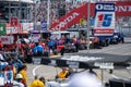 Place to change parts on sports cars and a crowd in the background during Toronto Indy Car Race 2022