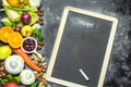 A place to write your own menu or recipe - blackboard, chalk and lots of fruits, vegetables and herbs