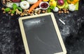 A place to write your own menu or recipe - blackboard, chalk and lots of fruits, vegetables and herbs