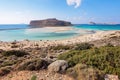 Place for tourists rest Balos lagoon, shore of Crete island, Greece. Ionian, Aegean and Libyan seas. Scenery of sunny summer day. Royalty Free Stock Photo