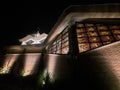 Place of worship night Easter holidays church view of the illuminated night stained glass in the window of the temple evening pray Royalty Free Stock Photo