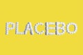 Placebo is a medical concept in trendy colors. The tablets are lined with the word PLACEBO.Ultimate Gray and