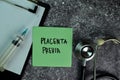 Placenta Previa write on sticky notes on the table. Medical or Healthcare concept