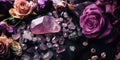Placer of amethyst, quartz stones and purple rose flowers on black surface, top view, close-up