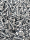 placer of iron bolts, construction fasteners, industrial metal background