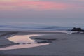 A placid early morning sunrise at Baggies Beach near Durban, South Africa Royalty Free Stock Photo