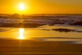 A placid early morning sunrise at Baggies Beach near Durban, South Africa Royalty Free Stock Photo