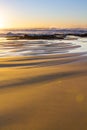 A placid early morning sunrise at Baggies Beach near Durban, South Africa Royalty Free Stock Photo