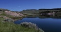 Placid lake in a hilly valley 4k 24fps