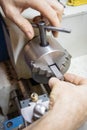 hands of a man repairing a machine Royalty Free Stock Photo