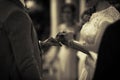 Placing ring on finger at a wedding