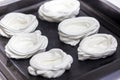 Placing and shapping meringues on a baking sheet