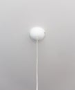 Plafond white for ceiling chandelier. Protective cap for an electric cord for a ceiling chandelier Royalty Free Stock Photo
