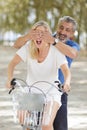 plaful active seniors with bicycle Royalty Free Stock Photo