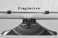 Plagiarism typed on an old typewriter. vintage thing. Copyright.