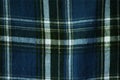 Plaid fabric background closeup laying flat