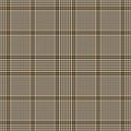 Plaid pattern glen in gold brown, beige, black for spring autumn winter. Seamless tweed tartan check plaid graphic vector. Royalty Free Stock Photo