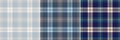 Plaid pattern set in navy blue, yellow, beige, brown for flannel shirt. Seamless classic textured tartan check background vector. Royalty Free Stock Photo