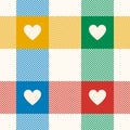 Plaid pattern for Valentines Day in colorful bright blue, green, red, yellow, off white. Seamless tartan with hearts for flannel. Royalty Free Stock Photo