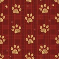 Plaid winter time seamless red pattern with doodle paw prints