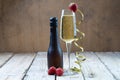 Glass of champagne sparkling wine alcohol bar trendy hotel bartender garnish