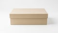 Plain beige cardboard box with simple lid design placed on a white surface Royalty Free Stock Photo