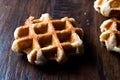 Plain Belgium Waffle on wooden surface. Royalty Free Stock Photo