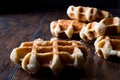 Plain Belgium Waffle on wooden surface. Royalty Free Stock Photo