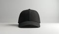 Plain black baseball cap shown front on. Simple headwear offers blank canvas for custom logo, design, or text. Versatile Royalty Free Stock Photo