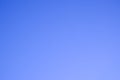Plain blue background. Clear, deep cloudless sky Royalty Free Stock Photo