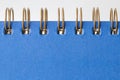 Plain blue cover book paper note pad with spiral bind spine and Royalty Free Stock Photo