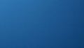 A plain blue surface with a smooth texture, devoid of any patterns or cracks Royalty Free Stock Photo