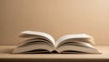 Plain book display, Minimalist open volume on neutral surface Royalty Free Stock Photo