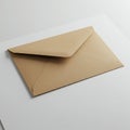 A plain, brown envelope is centrally placed on a white, flat surface. The envelope is Royalty Free Stock Photo