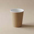 A plain brown paper cup with a white interior is positioned upright against a matching Royalty Free Stock Photo