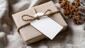 Plain Brown Wrapped Wedding Present With A Blank White Gift Tag Tied With Twine - Classic And Royalty Free Stock Photo