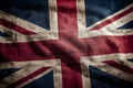 Plain cloth Union Jack national flag of the United Kingdom of Great Britain and Northern Ireland is soiled and crumpled Royalty Free Stock Photo