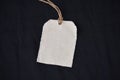 Plain clothing tag mockup on black background