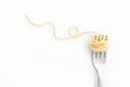 Plain cooked spaghetti pasta on fork with swirl, on white background. Royalty Free Stock Photo