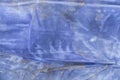 Plain dark blue fabric made of artificial materials as a wallpaper close-up Royalty Free Stock Photo