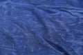 Plain dark blue fabric made of artificial materials as a wallpaper close-up Royalty Free Stock Photo