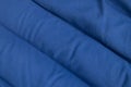 Plain dark blue fabric made of artificial materials as wallpaper close-up Royalty Free Stock Photo